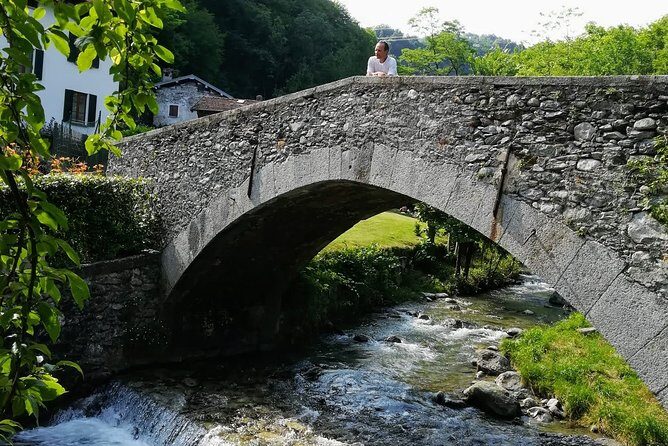 E-Bike Tour around Three Lakes and Idyllic Mountain Life - Velzo and Naggio: grapes, tight village turns, then a Lake Lugano reveal