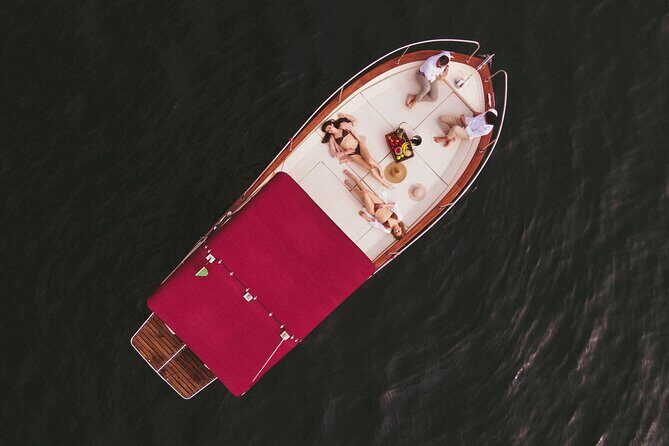 Private Boat Tour on Italian Gozzo on Lake Como - Bellagio from your seat: gardens, cobbles, and the Grand Hotel