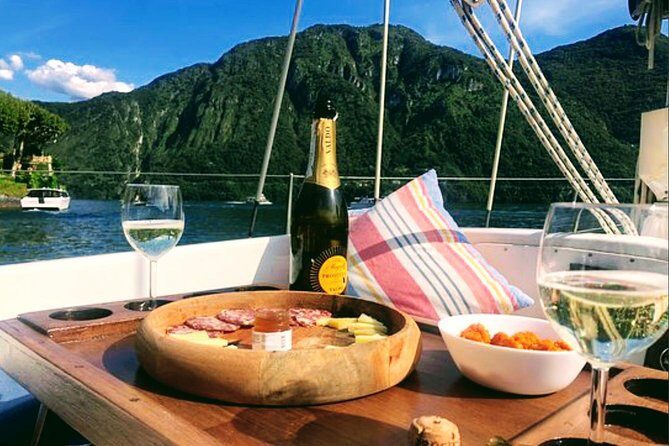Sailing Experience on Lake Como with Private Skipper - Swim break and weather reality on Lake Como